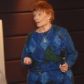 photo of Thelma Holt with microphone
